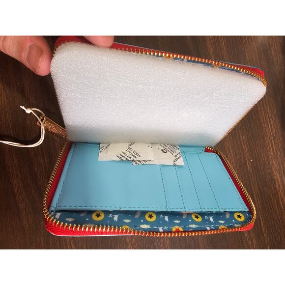 LOUNGEFLY DISNEY DUMBO BOOK SERIES ZIP AROUND WALLET Multicolor - Picture 4 of 5